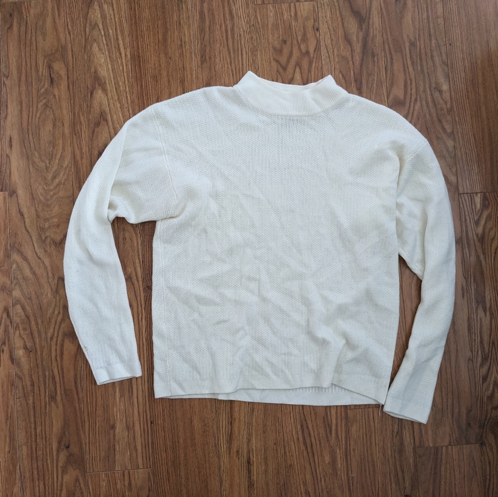 White mock-neck sweater